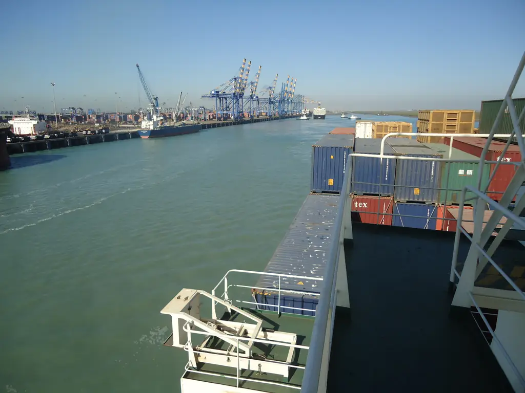 Container ship approaching the container terminal at the port of Mundra, Gujarat